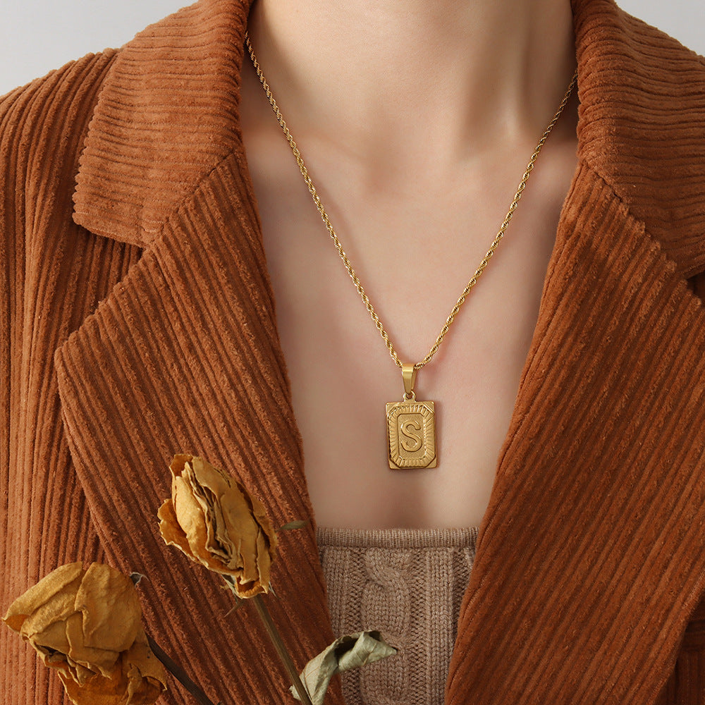 Cold wind niche light luxury retro high-end sense tag necklace titanium steel plated 18K real gold women's jewelry