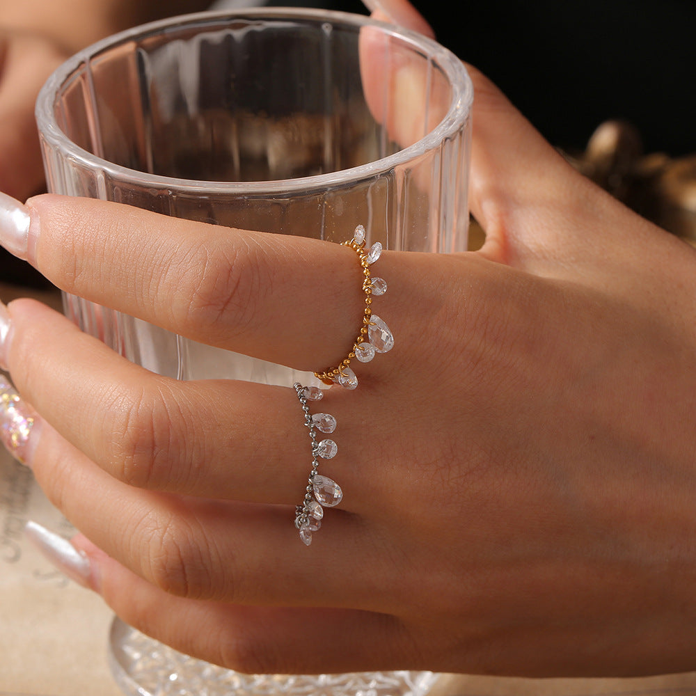 Cold wind personalized rice bead chain jewelry crystal stone pendant pull button titanium steel gold-plated ring 99
