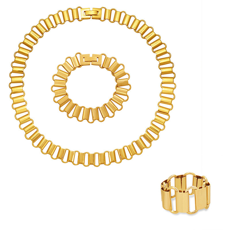Cold wind light luxury hollow geometric ring necklace bracelet combination titanium steel plated 18K real gold set
