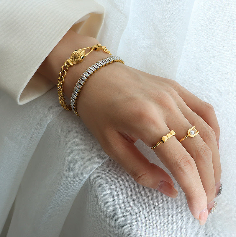 Cold wind couple bracelet snakehead green eyes zircon titanium steel plated 18K gold simple jewelry wholesale 99