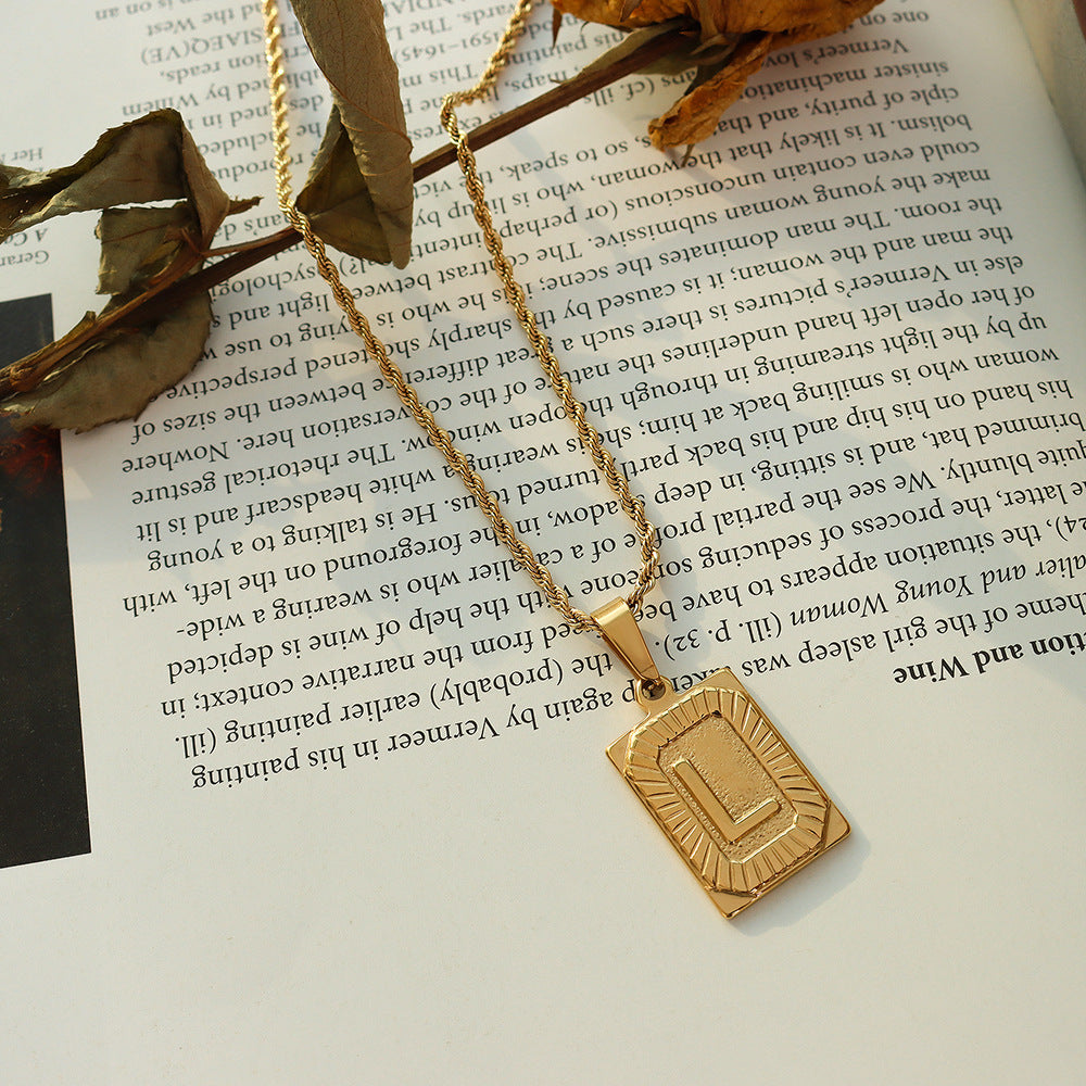 Cold wind niche light luxury retro high-end sense tag necklace titanium steel plated 18K real gold women's jewelry