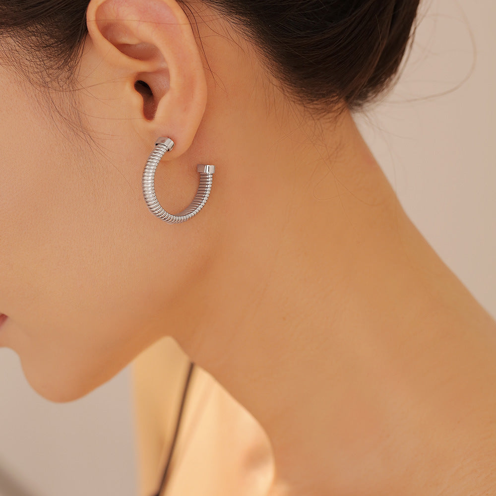 Stylish simple personality niche elegant jewelry geometric multi-layer design titanium steel gold-plated C-shaped earrings