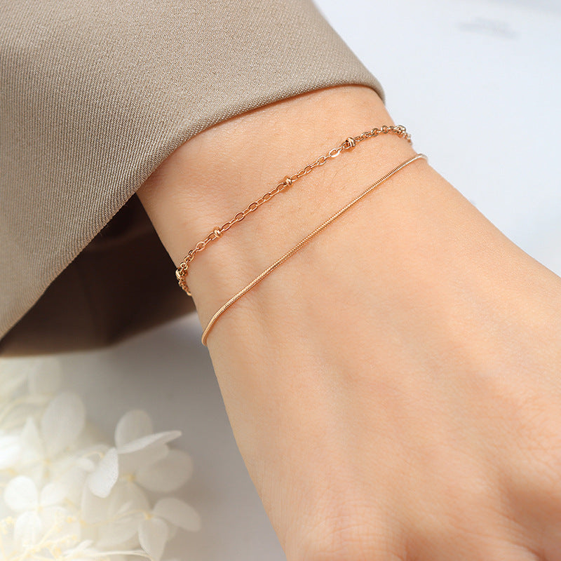 Jewelry Detailed Double-layer Snake Bone Chain Exquisite Bracelet Bag Bead Chain Titanium Steel Plated 18K Gold Jewelry E08599