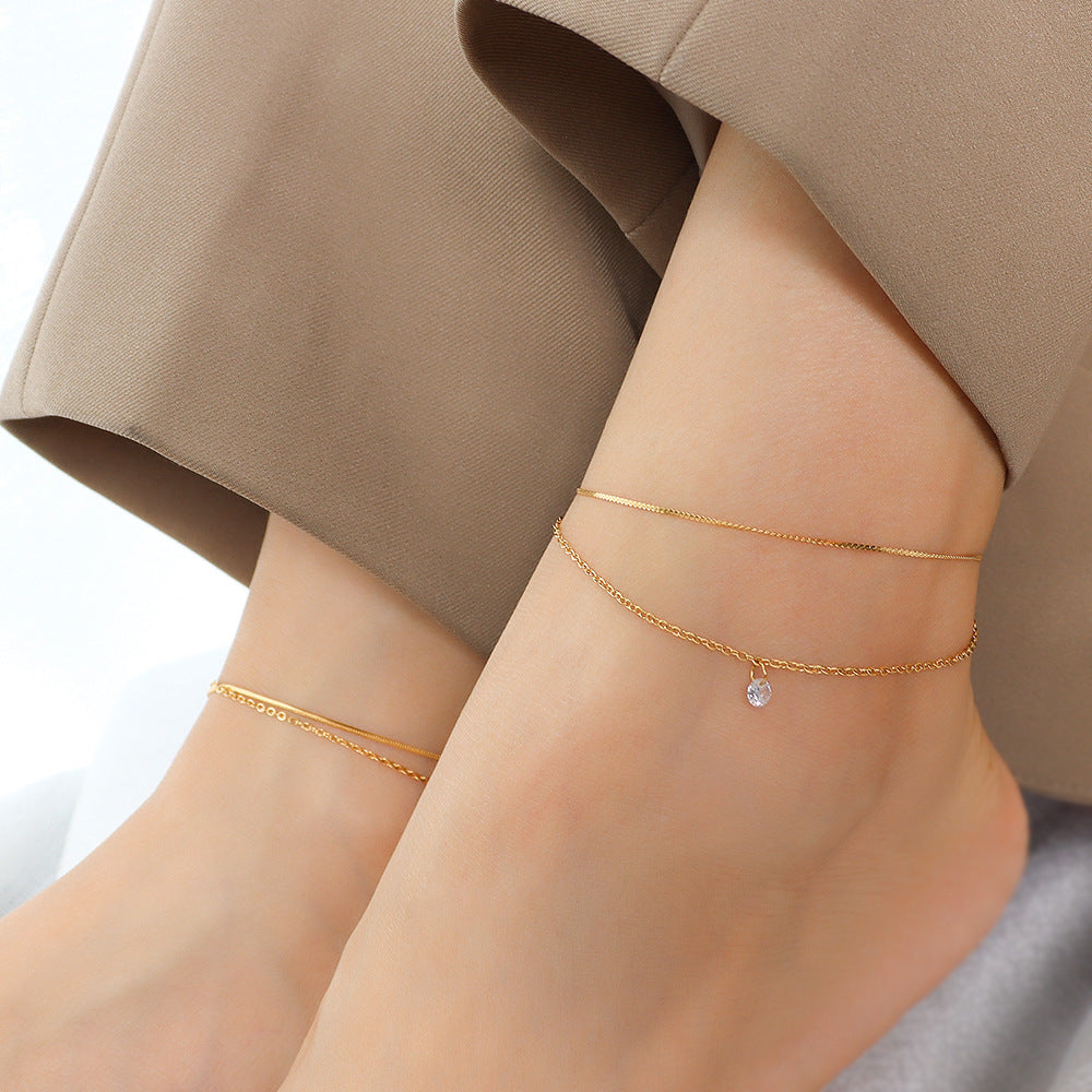 Cold wind light luxury personality double-layer simple niche inlaid zircon titanium steel plated 18k gold foot decoration