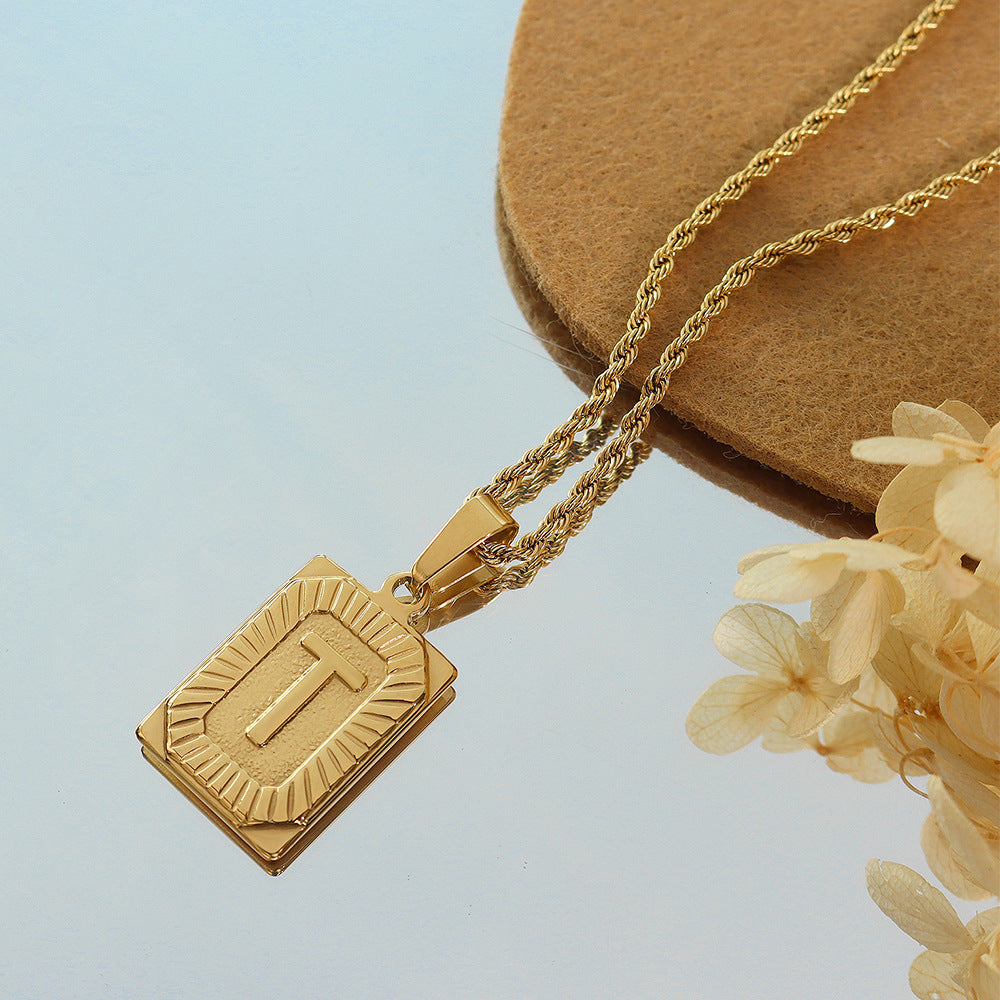 Cold wind niche light luxury retro high-end sense tag necklace titanium steel plated 18K real gold women's jewelry