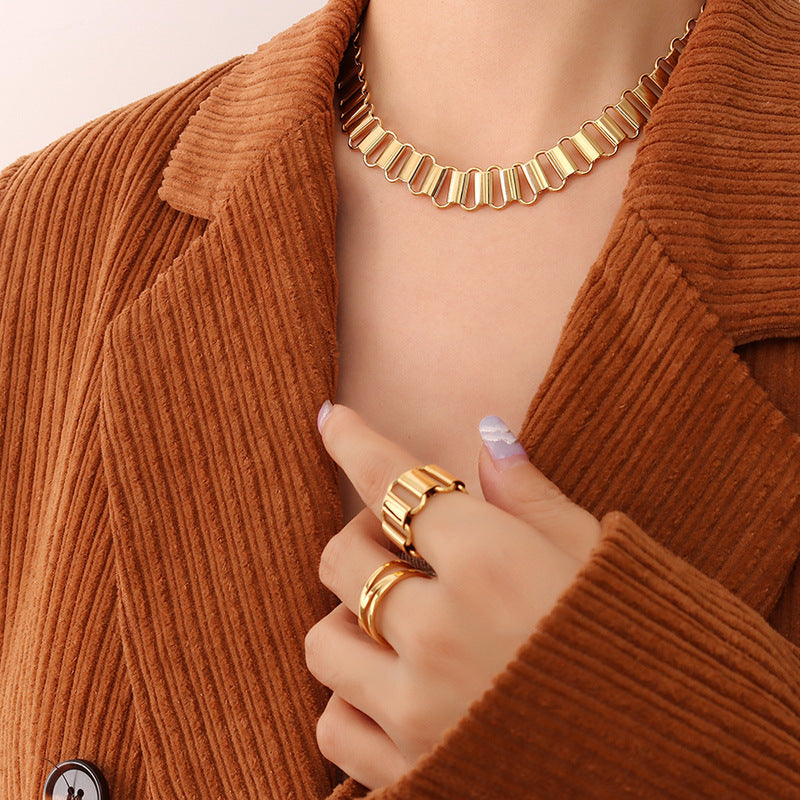 Cold wind light luxury hollow geometric ring necklace bracelet combination titanium steel plated 18K real gold set
