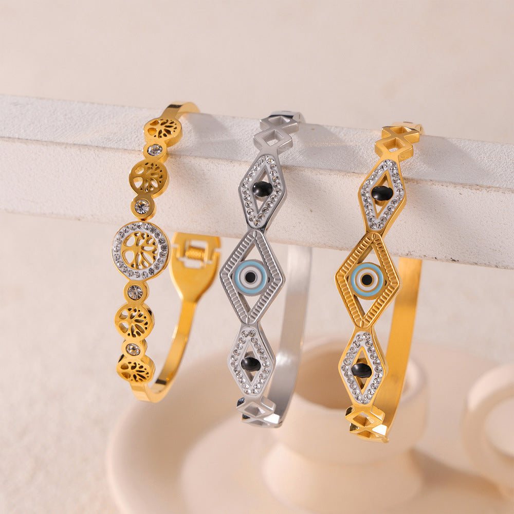 Hot-selling niche personalized hollow jewelry devil's eye tree of life diamond-encrusted design titanium steel gold-plated bracelet pp