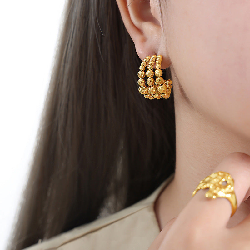 C-shaped semicircular three-layer steel ball splicing niche design metal texture fashionable personalized titanium steel plated K gold earrings