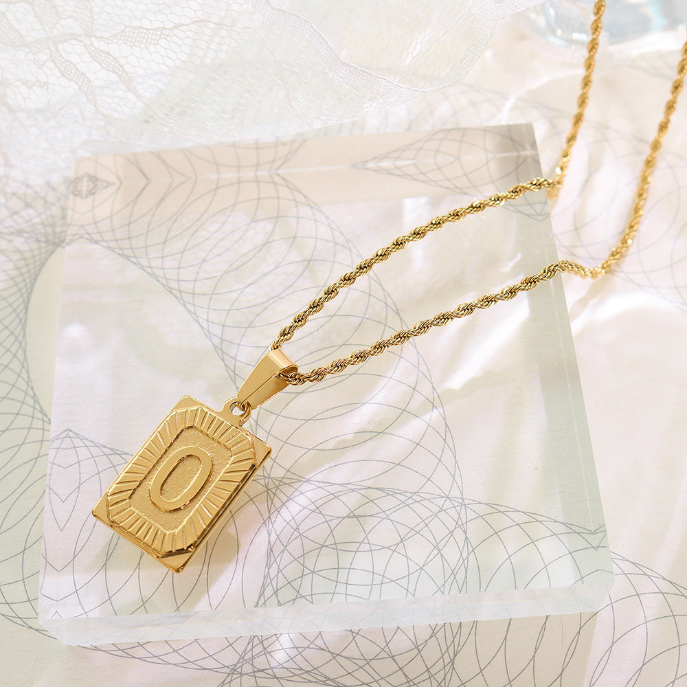 Cold wind niche light luxury retro high-end sense tag necklace titanium steel plated 18K real gold women's jewelry