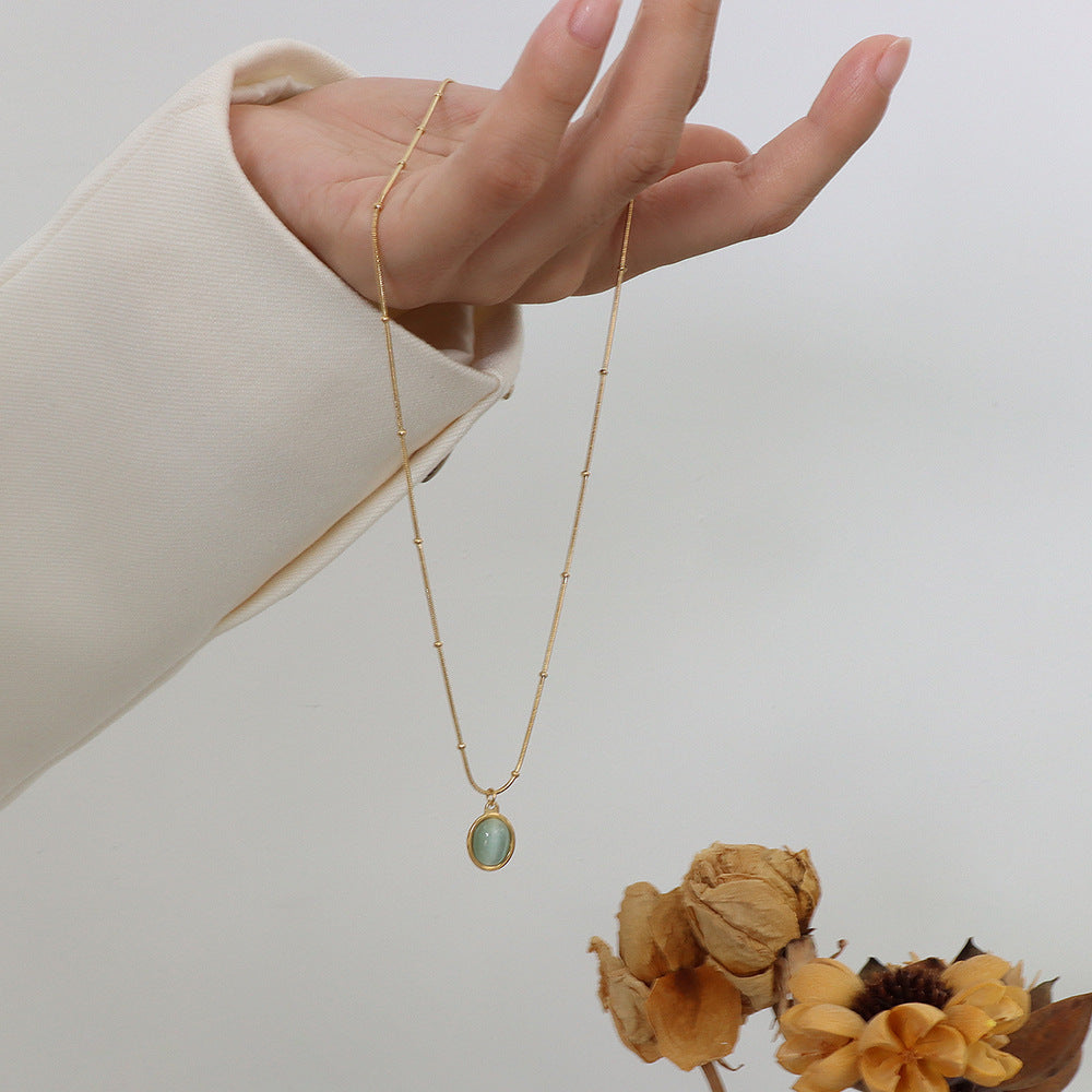 Retro style premium sense niche versatile 18k gold collarbone chain opal oval pendant titanium steel necklace female 99