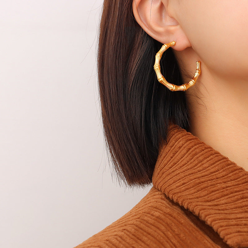 Niche design fashionable geometric C-shaped bamboo earrings electroplated 18K gold non-fading personalized earrings F565