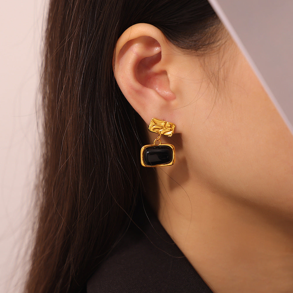 Wind retro niche pleated texture square brand earrings inlaid with black glass design titanium steel gold-plated earrings