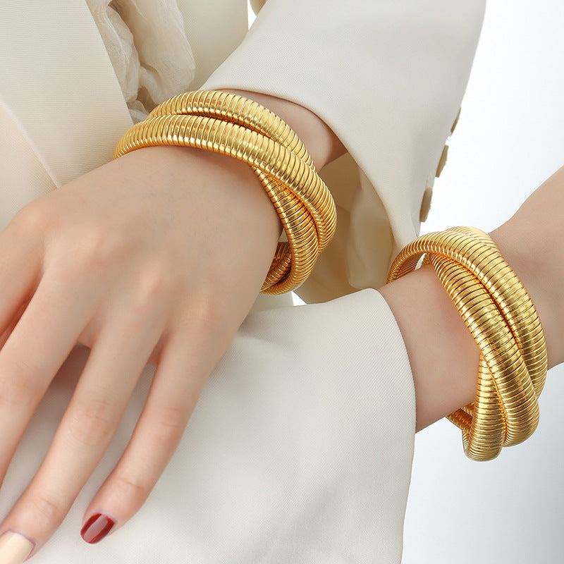 Hot-selling light luxury fashion gold-plated three-layer bracelet titanium steel serpentine winding elastic bracelet jewelry women 99