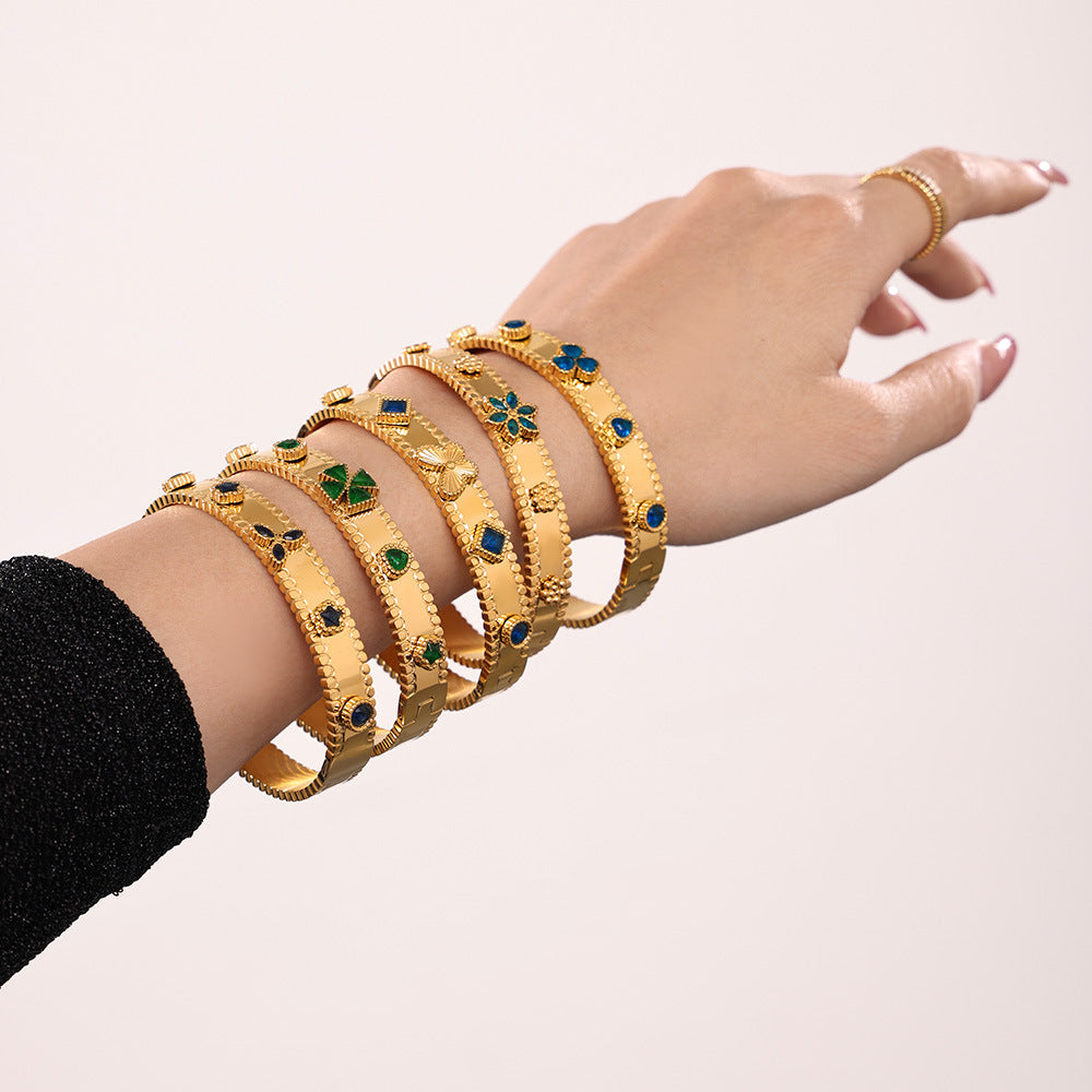 Stainless steel four-leaf flower zircon Czech glass women's buckle gear bracelet does not fade, plated with 18K gold pp