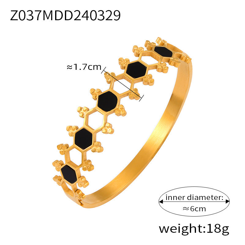 Simple personality niche geometric hollow jewelry texture design sense inlaid diamond design sense titanium steel gold-plated bracelet