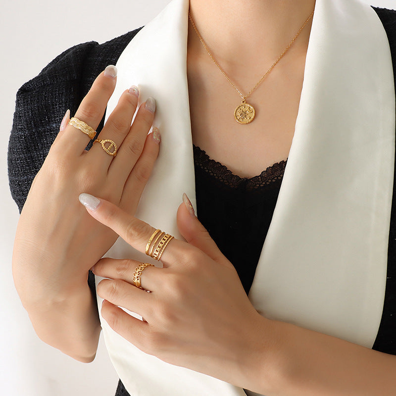Geometric cold wind versatile zircon star and moon romantic necklace, titanium steel gold-plated round pendant necklace.