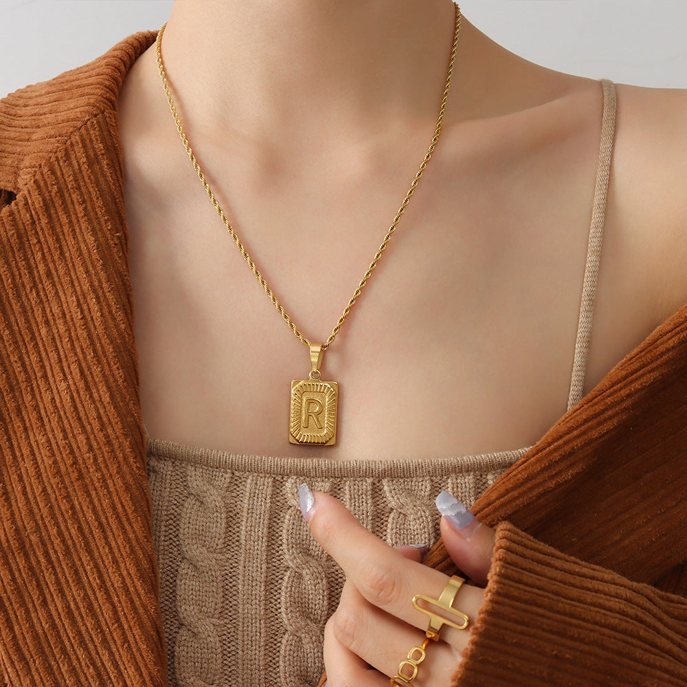 Cold wind niche light luxury retro high-end sense tag necklace titanium steel plated 18K real gold women's jewelry