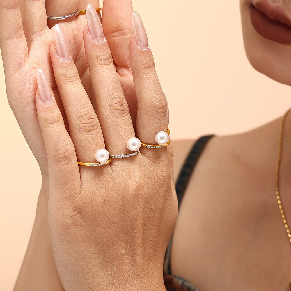 Exquisite and elegant micro-inlaid zircon Shijia pearl open ring for women, niche light luxury titanium steel ring jewelry wholesale 99
