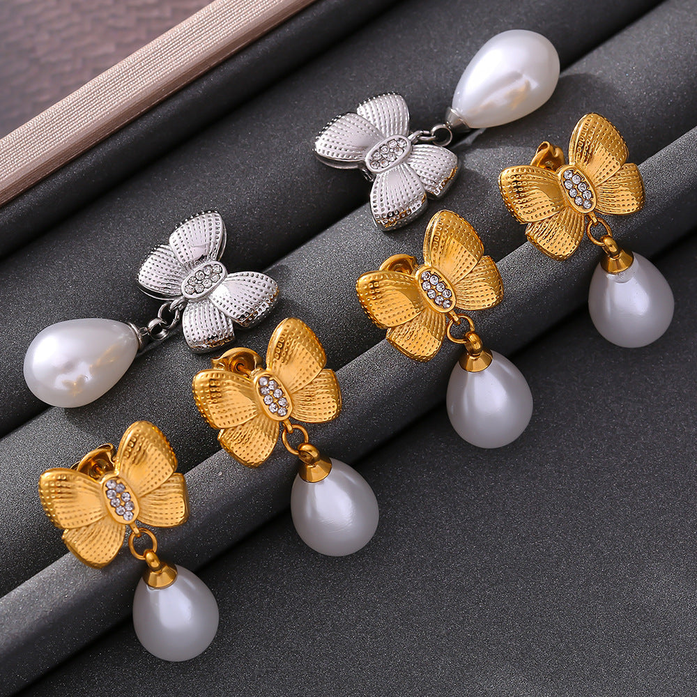 Bow tassel imitation pearl earrings women's niche diamond-set titanium steel-plated 18k gold fashion earrings 99