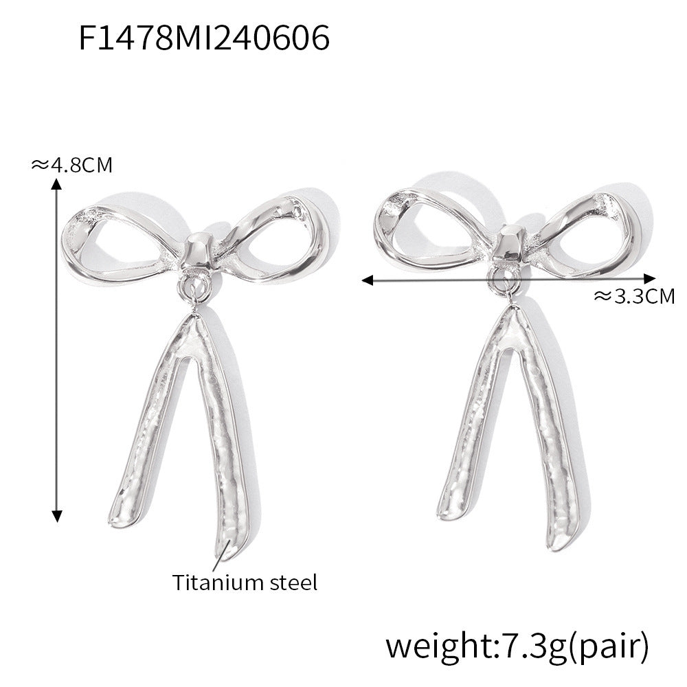 Light luxury bow tassel ribbon stud earrings stainless steel plated 18K real gold fairy earrings spot wholesale