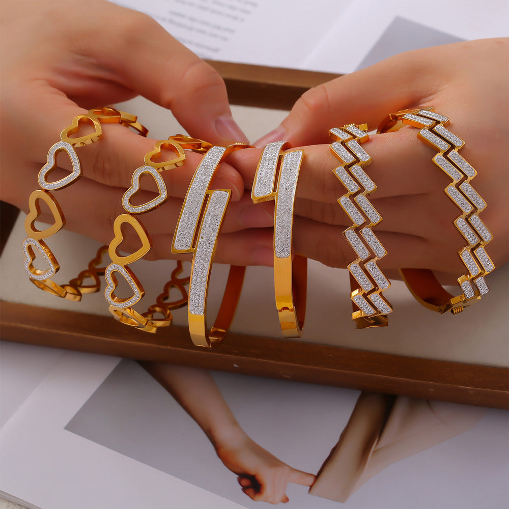 Hot-selling simple and versatile light luxury jewelry geometric diamond-set design sense multi-layer hollow titanium steel gold-plated bracelet