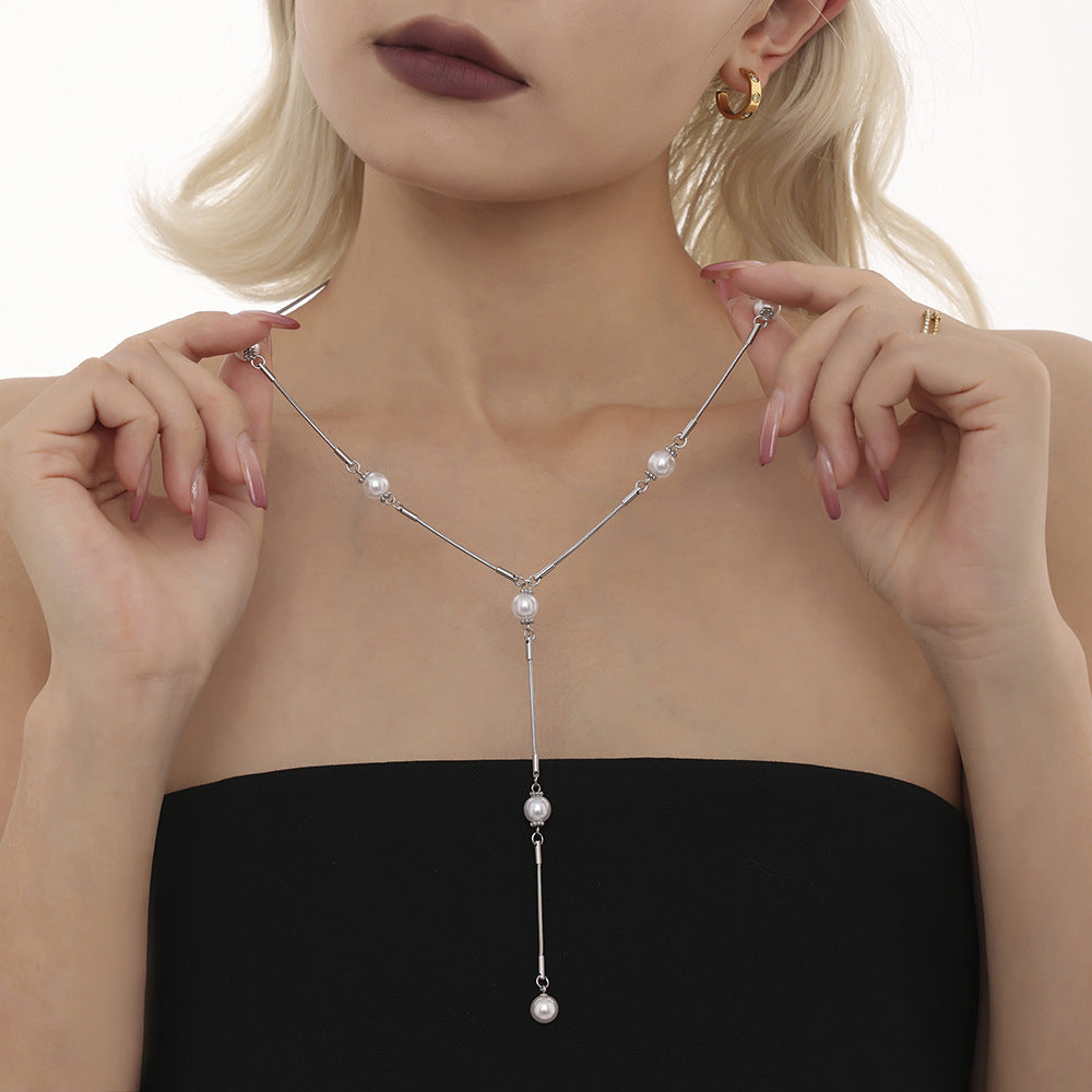 Stainless steel imitation pearl Y character autumn and winter clavicle sweater chain European and American light luxury fringed necklace spot pp