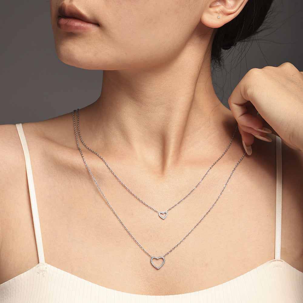 Hot-selling British niche design double-layer necklace female love zirconium embedded impermeable steel pp