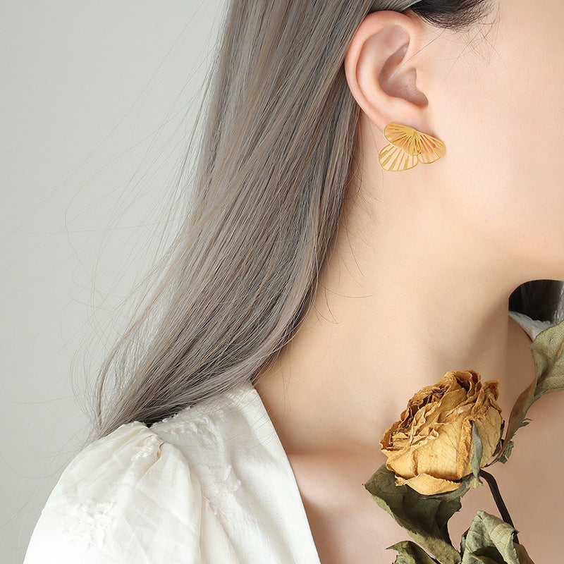 Titanium steel jewelry unique personality creative butterfly dancing earrings niche design gold-plated earrings women