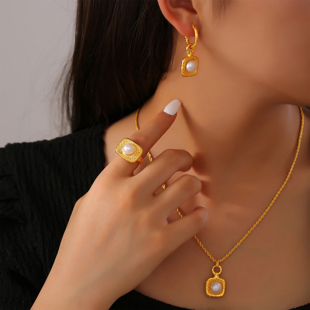 Personality niche polka dot texture design freshwater pearl jewelry temperament elegant titanium steel fashion suit