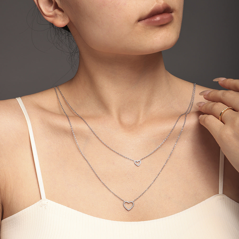 Hot-selling British niche design double-layer necklace female love zirconium embedded impermeable steel pp
