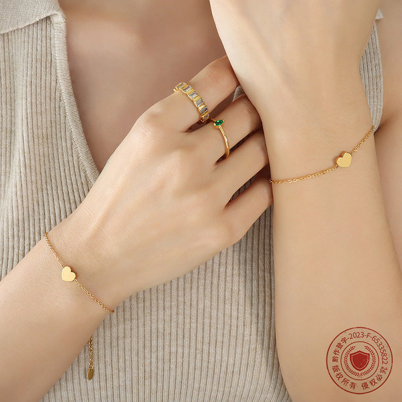 Internet celebrity small love bracelet female, versatile simple titanium steel bracelet, plated with 18K real gold, non-fading and non-allergic E072
