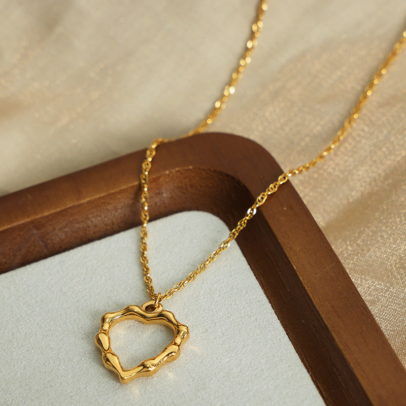New simple niche design fashionable versatile irregular love titanium steel gold-plated pendant necklace jewelry female pp