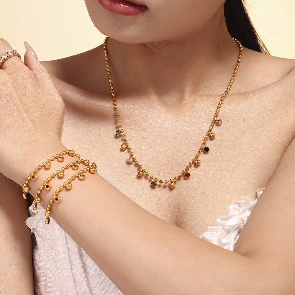 Colored glass round bead collarbone chain bracelet niche exquisite titanium steel plated 18k real gold set 99