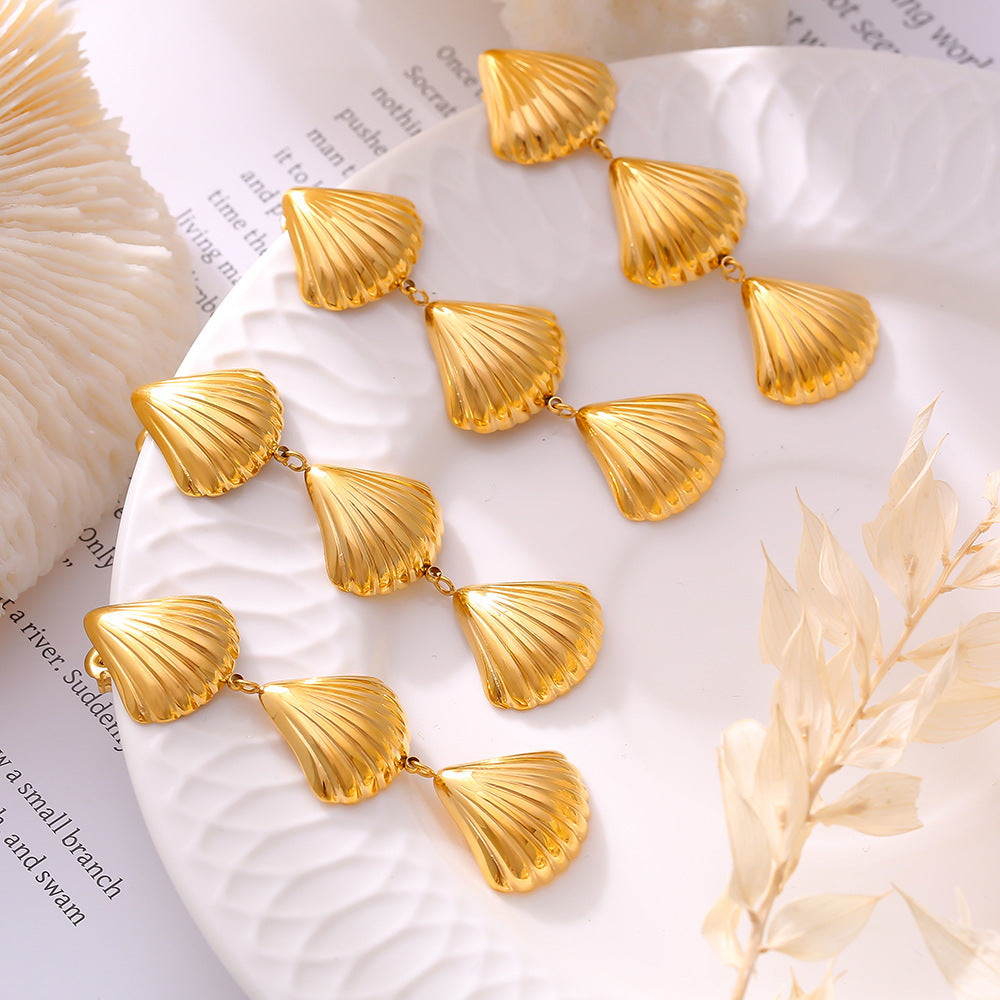 Cross-border ocean series beach wind three shell fringed earrings European and American retro temperament design stainless steel gold-plated