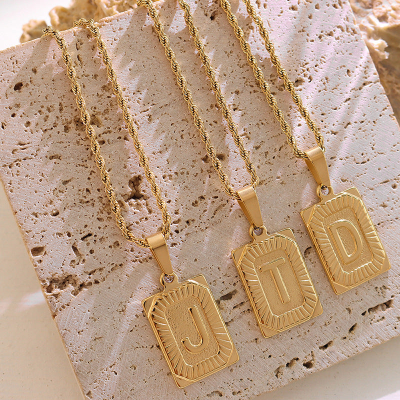 Cold wind niche light luxury retro high-end sense tag necklace titanium steel plated 18K real gold women's jewelry