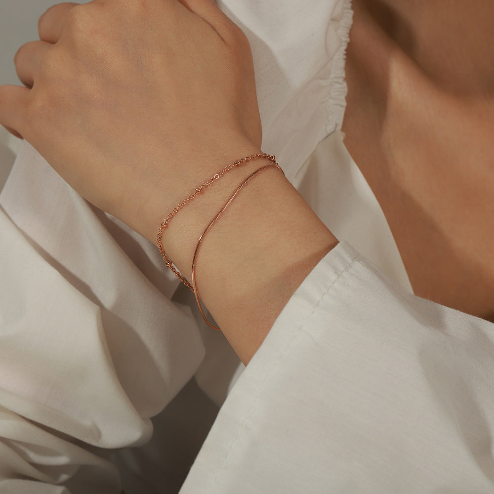 New simple personality niche design titanium steel gold-plated lobster buckle double-layer bracelet jewelry wholesale