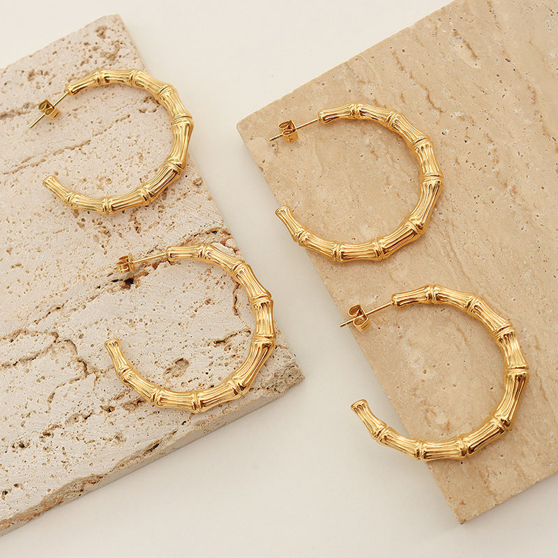 Niche design fashionable geometric C-shaped bamboo earrings electroplated 18K gold non-fading personalized earrings F565