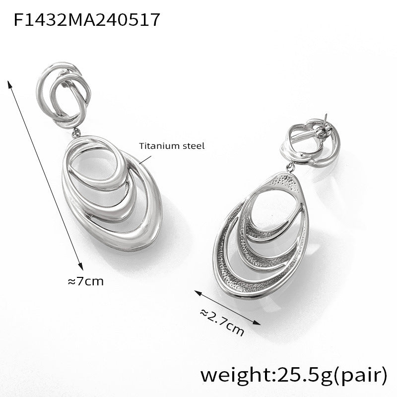 Hip-hop style, unique personality, niche exaggerated earrings, geometric line winding design sense, double-layer titanium steel gold-plated earrings