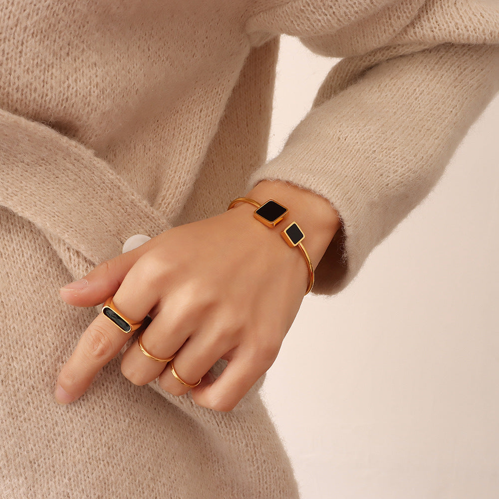 Open soft wire high elasticity versatile triangular square black shell bracelet, titanium steel plated 18K real gold jewelry