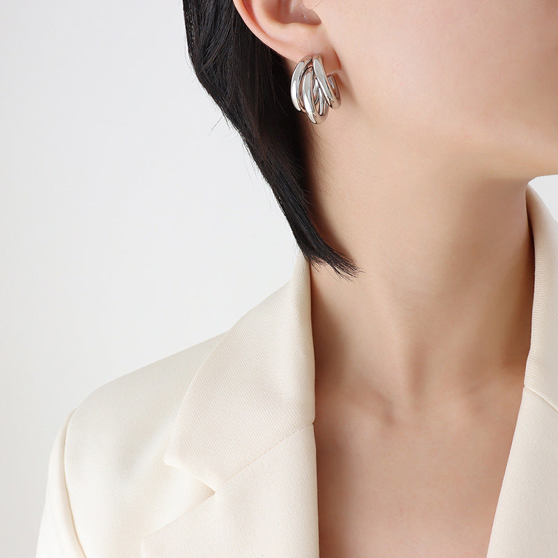 Niche design sense summer accessories personality tide three-layer C-shaped hollow tube titanium steel gold-plated earrings 99