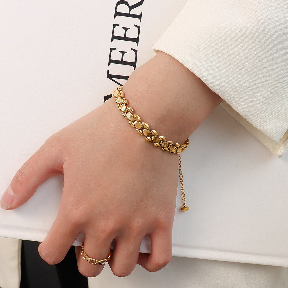 Cold wind bracelet women's widened watch chain jewelry titanium steel plated 18k gold color retention one piece hair 99