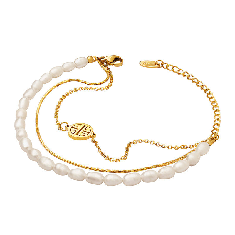Fashion light luxury personalized three-layer stacked titanium steel hand jewelry natural freshwater pearl lucky bracelet versatile jewelry women