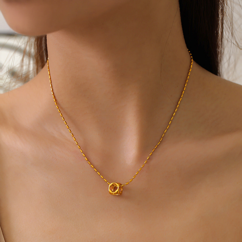 Leisure vacation style niche simple rice bead chain jewelry personalized hollow square pendant titanium steel gold-plated necklace pp