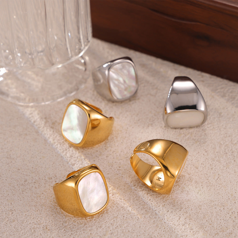 Hepburn style elegant gentle temperament wide-faced index finger ring inlaid with white fritillary design titanium steel gold-plated opening ring
