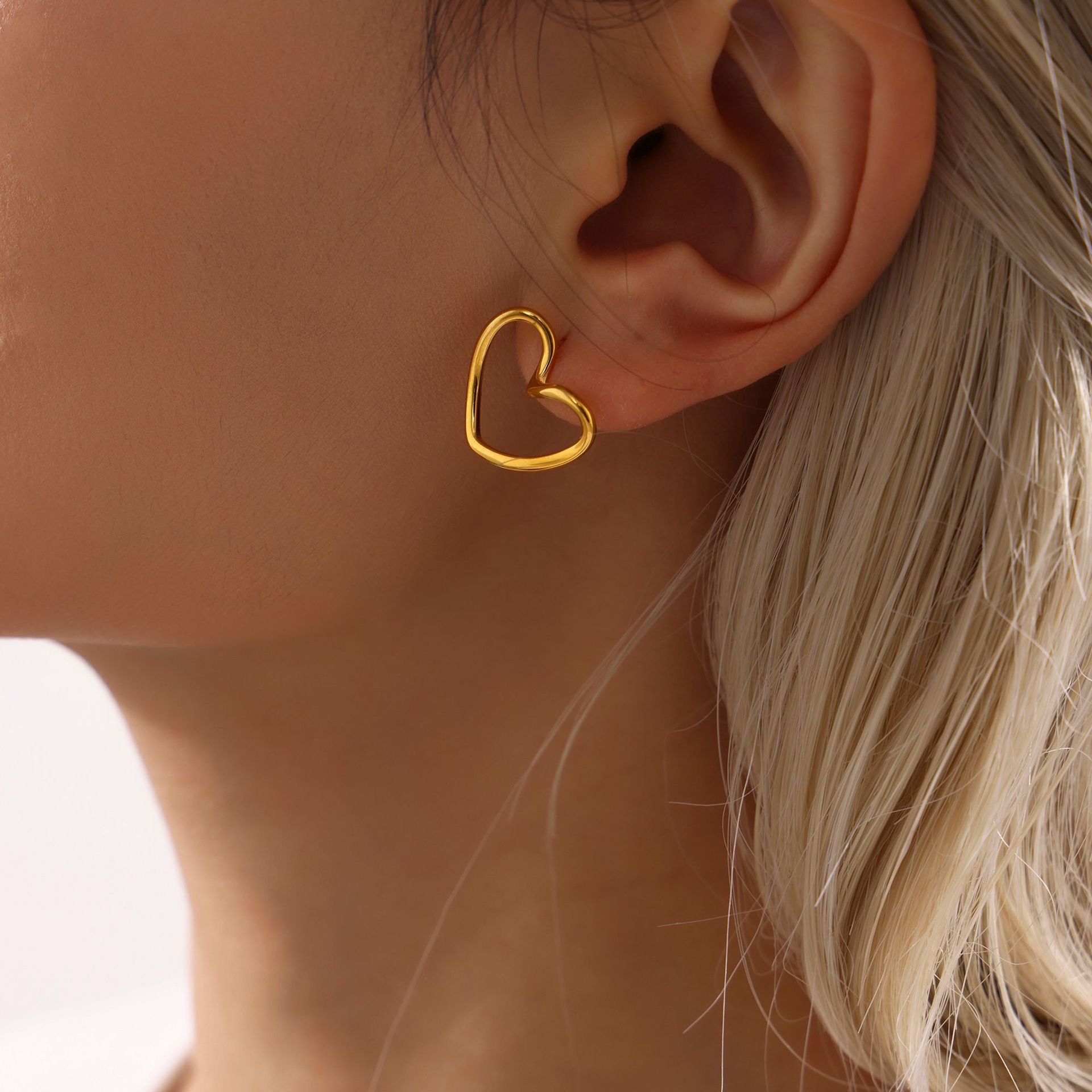 Hollow love stud earrings autumn and winter accessories INS style niche earrings titanium steel PVD plated 18K real gold jewelry