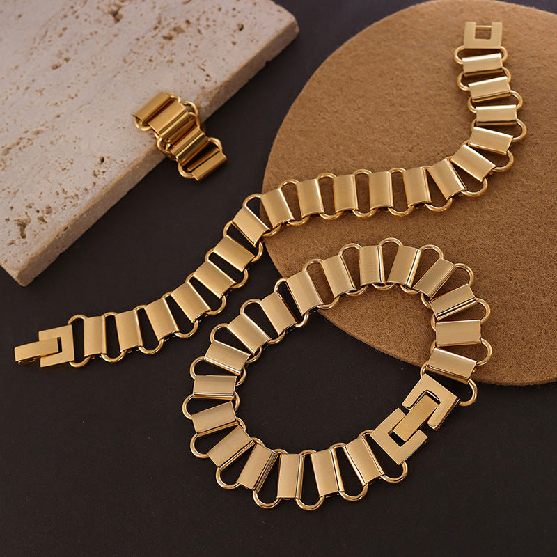 Cold wind light luxury hollow geometric ring necklace bracelet combination titanium steel plated 18K real gold set