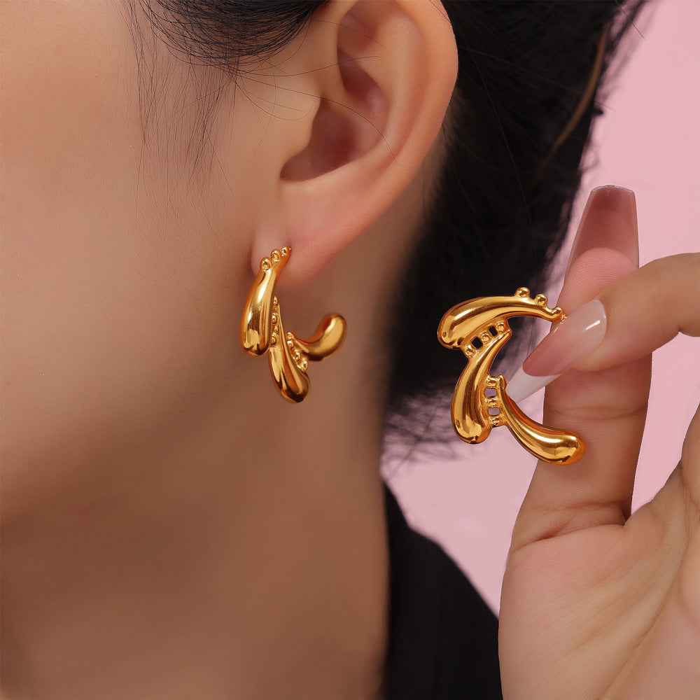 Fashion niche design temperament retro earrings water drop swirl splicing design sense titanium steel gold-plated stud earrings women