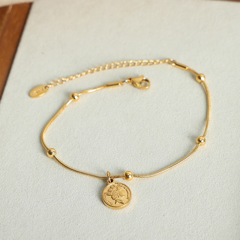 New fashion retro niche design titanium steel gold-plated cartoon face round brand pendant bracelet jewelry female pp