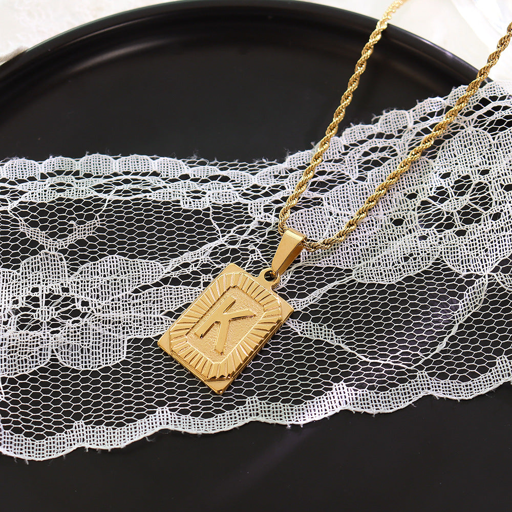 Cold wind niche light luxury retro high-end sense tag necklace titanium steel plated 18K real gold women's jewelry