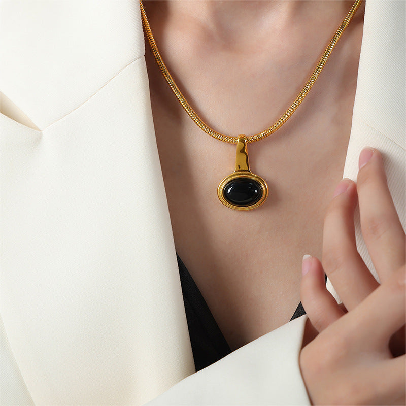New retro light luxury fashion versatile titanium steel gold-plated glass bead pendant niche necklace jewelry design female pp